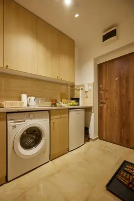 a kitchen with a washing machine and a washer at Best choice Hram centar in Belgrade