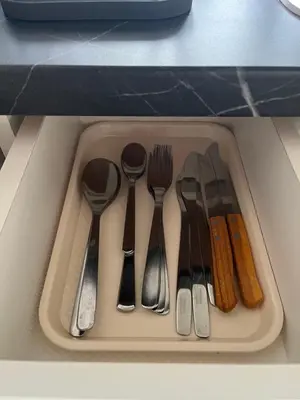 a tray with utensils in a drawer at Maxim in Pančevo
