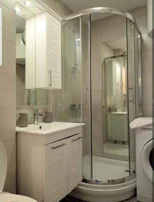 a bathroom with a shower and a sink and a toilet at Rose City Centre Apartment in Belgrade