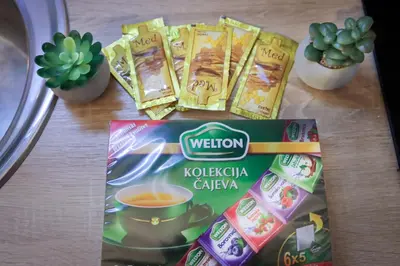 a table with a box of wisdom kuchenka celaya at Central Nusic apartment in Belgrade
