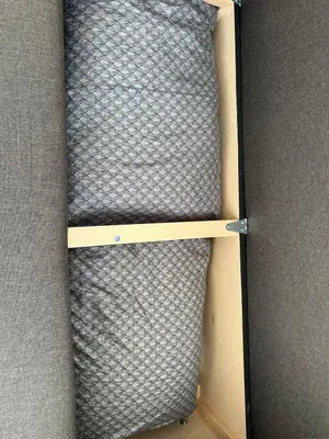 an open box with a mattress in it at lovely studio apartment in Belgrade