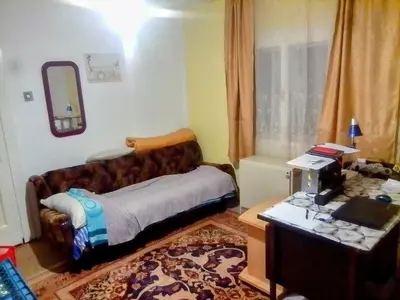 a living room with a couch and a table at Teranuovo in Belgrade