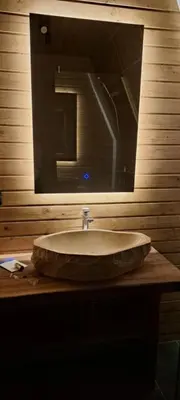 a bathroom sink with a large mirror above it at Villa SS Black Fruška Gora in Čortanovci