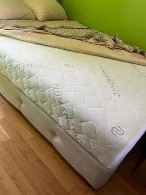 a mattress sitting on the floor in a room at La Casa Stan na dan in Belgrade