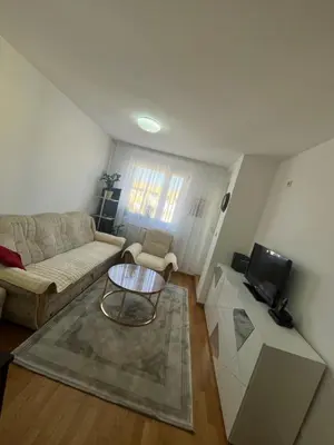 a living room with a couch and a table at La Casa Stan na dan in Belgrade