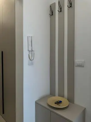 a wooden plate sitting on top of a cabinet at Dorcol Dream Apartment City View Terrace in Belgrade