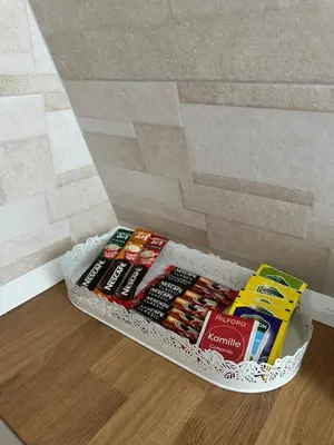 a box of candy on the floor in a room at Dorcol Dream Apartment City View Terrace in Belgrade