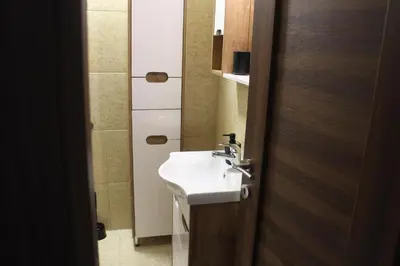 a bathroom with a sink and a mirror at Gavrila Principa Apartment in Belgrade