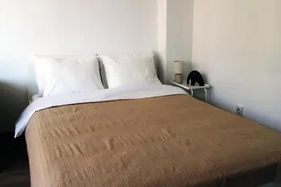a bedroom with a large bed with two pillows at Gavrila Principa Apartment in Belgrade
