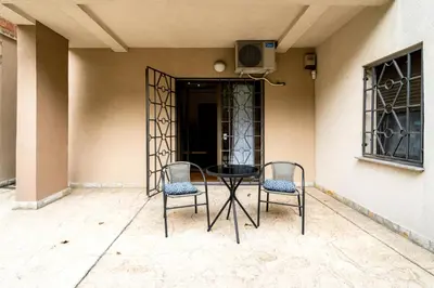 a table and two chairs on a patio at Apartment with balcony in Belgrade
