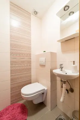 a bathroom with a toilet and a sink at Apartment with balcony in Belgrade
