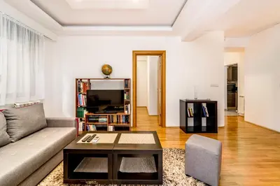 a living room with a couch and a coffee table at Apartment with balcony in Belgrade