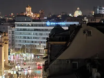 a view of a city at night with a building at Apartment Vera in Belgrade