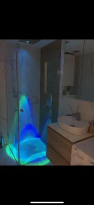 a bathroom with a shower with a toilet and a sink at Apartman Ilija in Belgrade