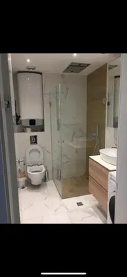 a bathroom with a toilet and a shower and a sink at Apartman Ilija in Belgrade