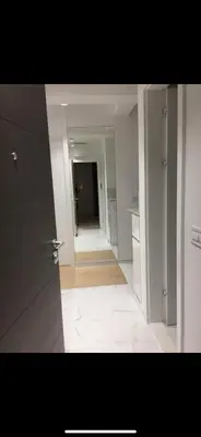 an empty room with a door and a hallway at Apartman Ilija in Belgrade