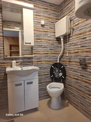 a bathroom with a toilet and a sink at Dream 5 in Belgrade
