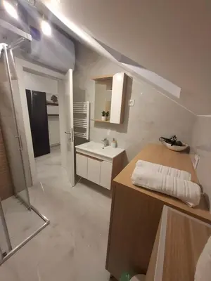 a bathroom with a sink and a counter top at Stef Lux Apartments in Belgrade