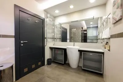 a bathroom with a sink and a large mirror at Emma in Belgrade