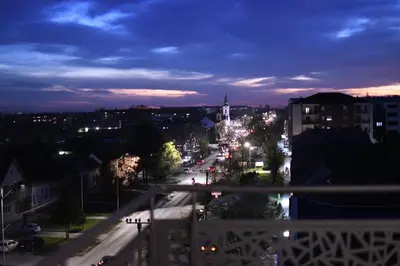 a view of a city street at night at Loft 43 in Stara Pazova
