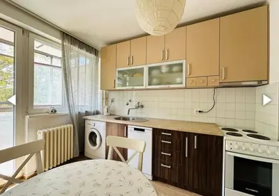 a kitchen with a sink and a dishwasher at Surya in Belgrade