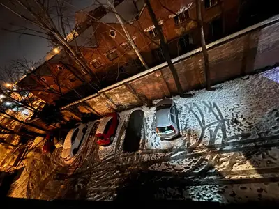 an overhead view of cars parked in a parking lot at Aktiva Apartments in Belgrade