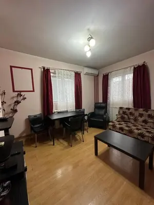 a living room with a couch and a table at Apartment Ruby in Belgrade