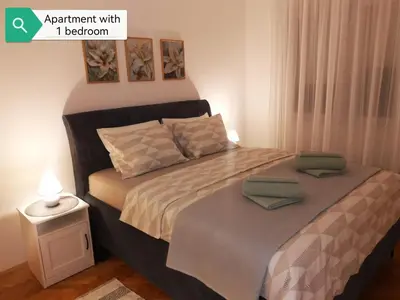 a bed with two pillows on it in a bedroom at Top House Belgrade in Belgrade