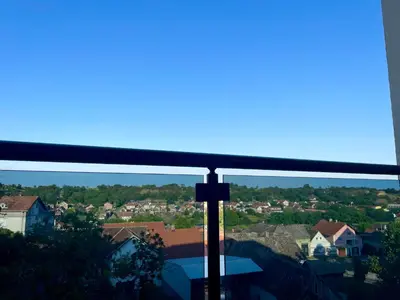 a view of a city from a window at Wine story in Irig
