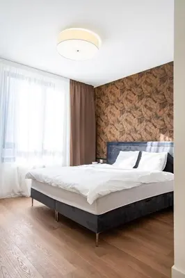 a bedroom with a large bed in a room at Aglaya Paris - Lux 2 Bedroom Apartment in Belgrade