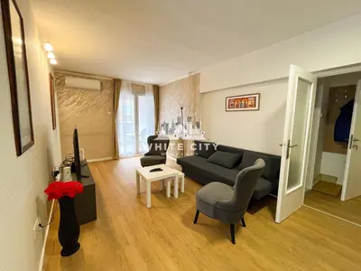 a living room with a couch and a table at WATEREFRONT Apartments - Belgrade in Belgrade
