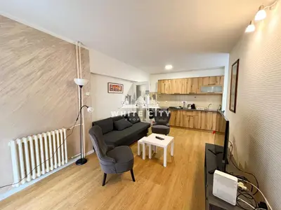 a living room with a couch and a table at WATEREFRONT Apartments - Belgrade in Belgrade