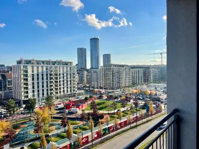 a view from a balcony of a city with buildings at The Gates 104 in Belgrade