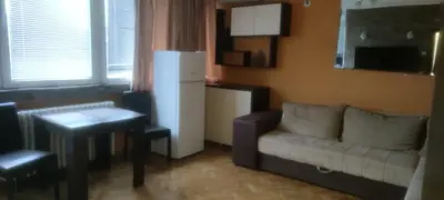 a small living room with a couch and a table at Medo in Belgrade