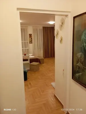 a hallway of a room with a living room at Apartman Vuk in Obrenovac