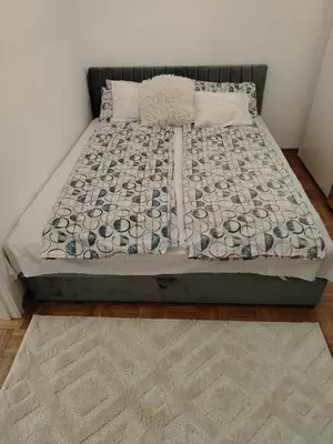 a bed in a bedroom with at Star Apartment Belgrade 1 in Belgrade