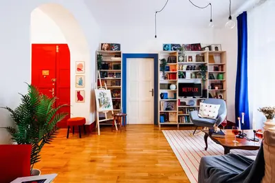 a living room with a couch and a table at Air Hockey Joy Old Town Heart in Belgrade