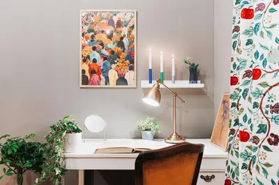 an office with a desk with a lamp and a painting at Air Hockey Joy Old Town Heart in Belgrade