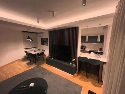 an aerial view of a living room and a kitchen at Penthouse city center in Belgrade