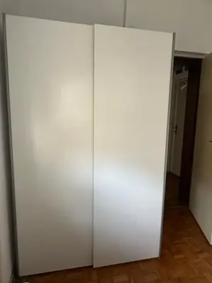 a white closet door in a room at Apartment Crystal in Belgrade