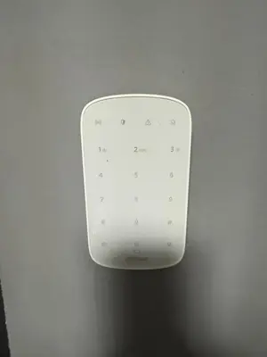 a white wii remote control hanging on a wall at Apartman Andrej in Belgrade