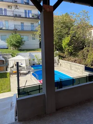 a view of a swimming pool from a building at Apartman Andrej in Belgrade
