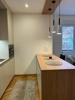 a kitchen with a island with a counter top at Skadarlija Urban Nest in Belgrade