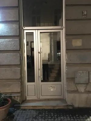 an entrance to a house with a glass door at Apartman Jovanovic in Belgrade