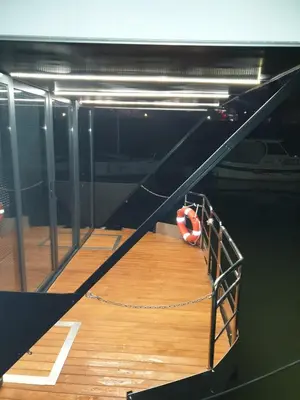 a staircase with a volley ball on a boat at Bright Room Houseboat in Belgrade