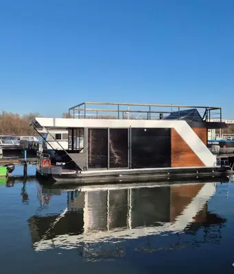 a house boat is docked at a marina at Bright Room Houseboat in Belgrade
