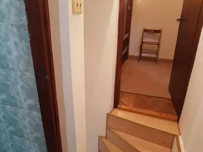 a stairway with a mirror and a stair case at Ozon in Belgrade