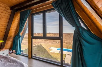 a room with a large window with a view at BlackPoolHouse in Belgrade