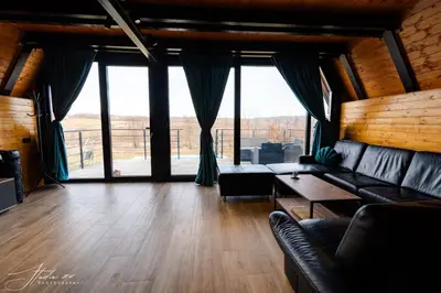 a living room with a couch and a table at BlackPoolHouse in Belgrade