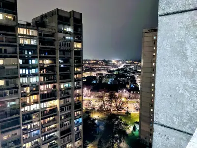 a view of a city at night with buildings at Danube Riverview in Belgrade
